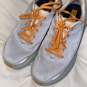 Hoka athletic shoes women’s size 9.